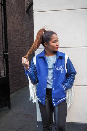 Blue baseball jacket with fringes and striped top